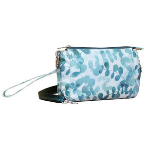Light blue crossbody bag with floral design and 'HAIKU' branding on a white background
