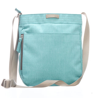 Wild Mint Jaunt Crossbody Bag back with white background 
