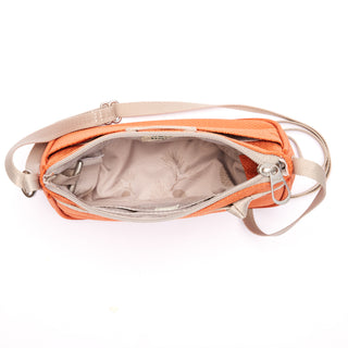 Orange Lark Crossbody bag interior on a white background
