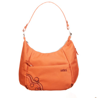 orange women's handbag on a white background