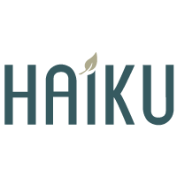 Logo of HAIKU with a leaf symbol on a white background