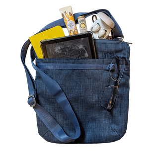 Blue bag with various items including a tablet, snacks, and glasses on a white background