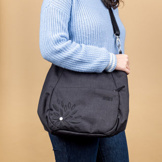Woman with Black In Bloom Amble Hobo bag